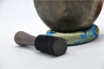Collected antique Mani singing bowl showing natural patina, aged surface marks, and authentic texture