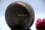 Collected antique Mani singing bowl showing natural patina, aged surface marks, and authentic texture