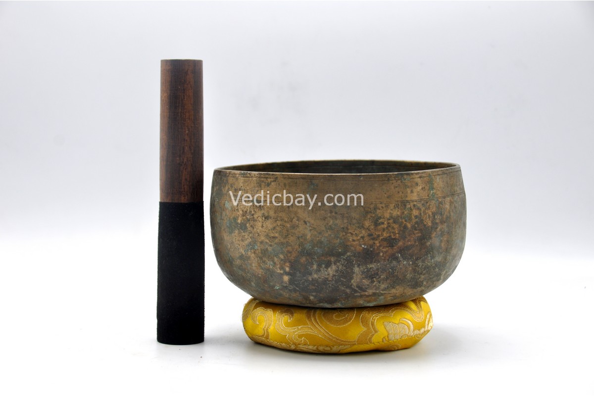 Antique Remuna singing bowl with inward-curved walls and rounded base – 6 inch Himalayan bowl