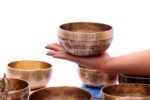 Mini Professional 7 Chakra Tibetan Singing Bowl Set handmade in Nepal with bowls, mallets, cushions, bell, tingsa, and incense burner